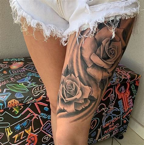 tattoo flor na coxa feminina|Tatuagens Florais na Coxa: Inspirações e Significados